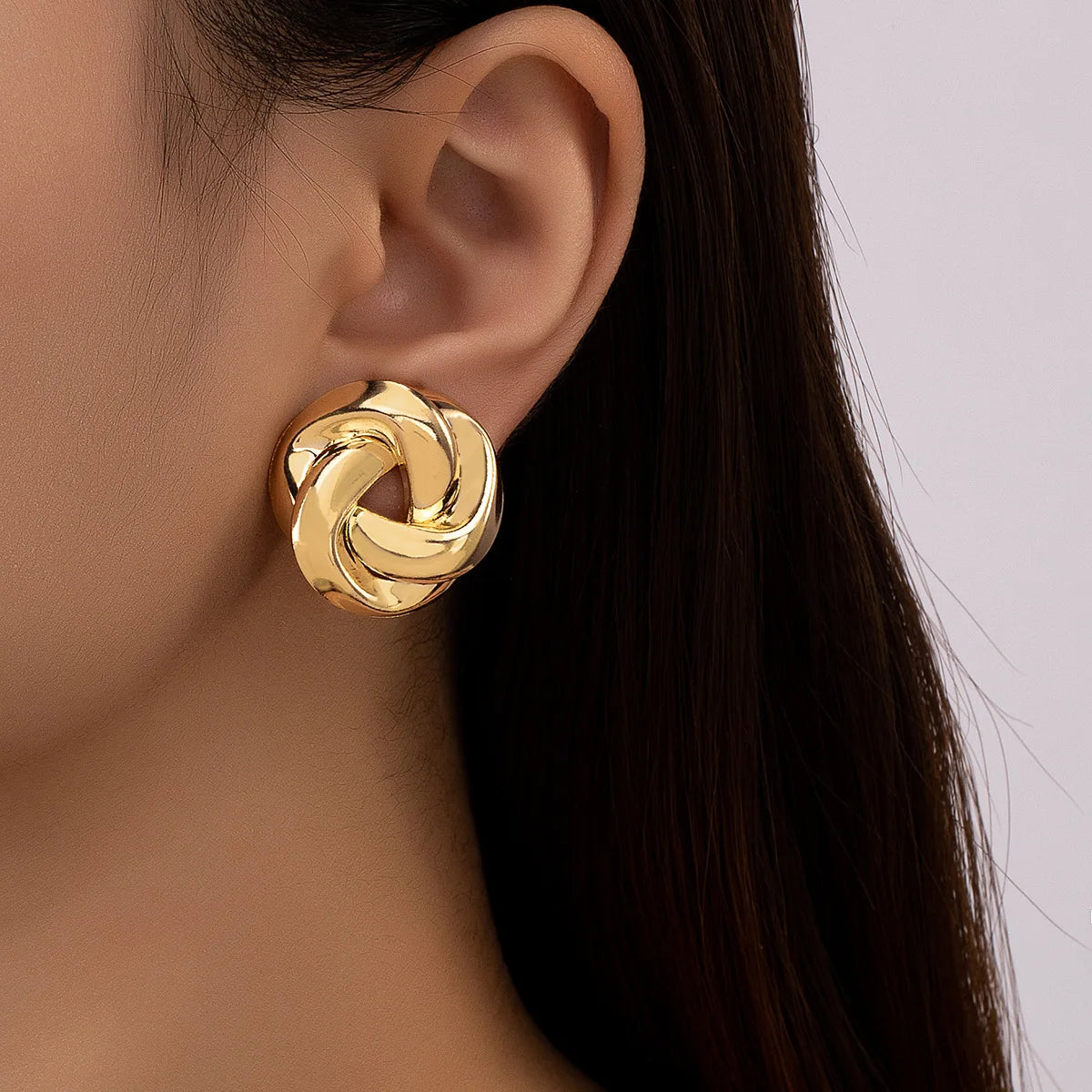Golden Twist Stud Earrings – Creative Geometric Women’s Jewelry